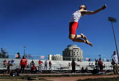 
Eastern Washington's Geoff Penrod jumps during the finals of the men's long jump in which he finished second to Idaho's Elvie Williams. 
 (Photos by RAJAH BOSE / The Spokesman-Review)
