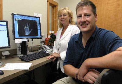 
Dr. Christopher Anderson is new to Northwest Orthopedic Specialists while X-ray tech Bonnie Haugen has worked there 20 years. NWOS has opened a new office at 12410 E. Sinto Ave. 
 (Dan Pelle / The Spokesman-Review)
