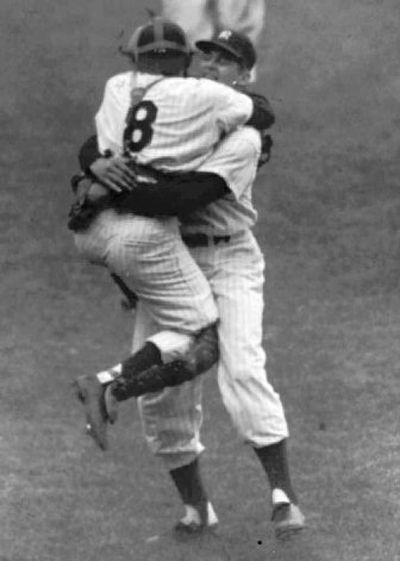 
Yogi Berra celebrates with Don Larsen after throwing the only perfect game in World Series history.
 (Associated Press / The Spokesman-Review)