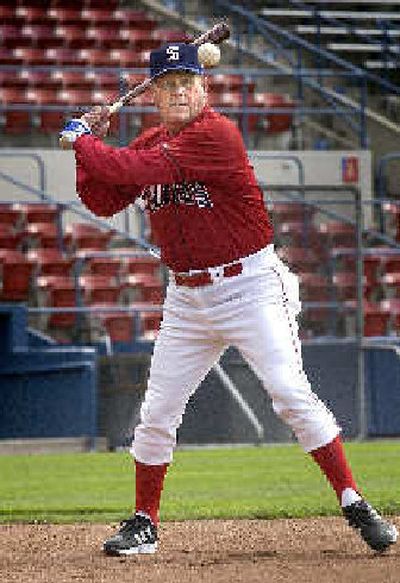 
Riddoch hits some infield practice. 
 (Brian Plonka / The Spokesman-Review)