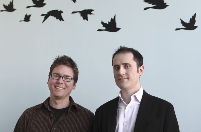ORG XMIT: FX204 ** FOR USE MONDAY, FEB. 16 AND THEREAFTER ** Twitter founders Biz Stone, left, and Evan Williams pose for a photo at their office in San Francisco, Thursday, Jan. 29, 2009. Twitter Inc. revolves around riffing in messages limited to 140 keystrokes.  Revenue has been conspicuously missing from the mix so far, raising questions about whether the nearly 3-year-old service can make the leap from intriguing fad to sustainable business. (AP Photo/Jeff Chiu) (Jeff Chiu / The Spokesman-Review)