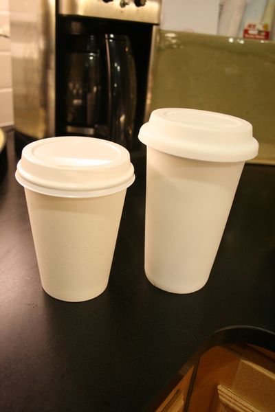 The cup on the left is a typical paper coffee cup. The cup on the right is reusable and made from porcelain. (Megan Cooley / The Spokesman-Review)