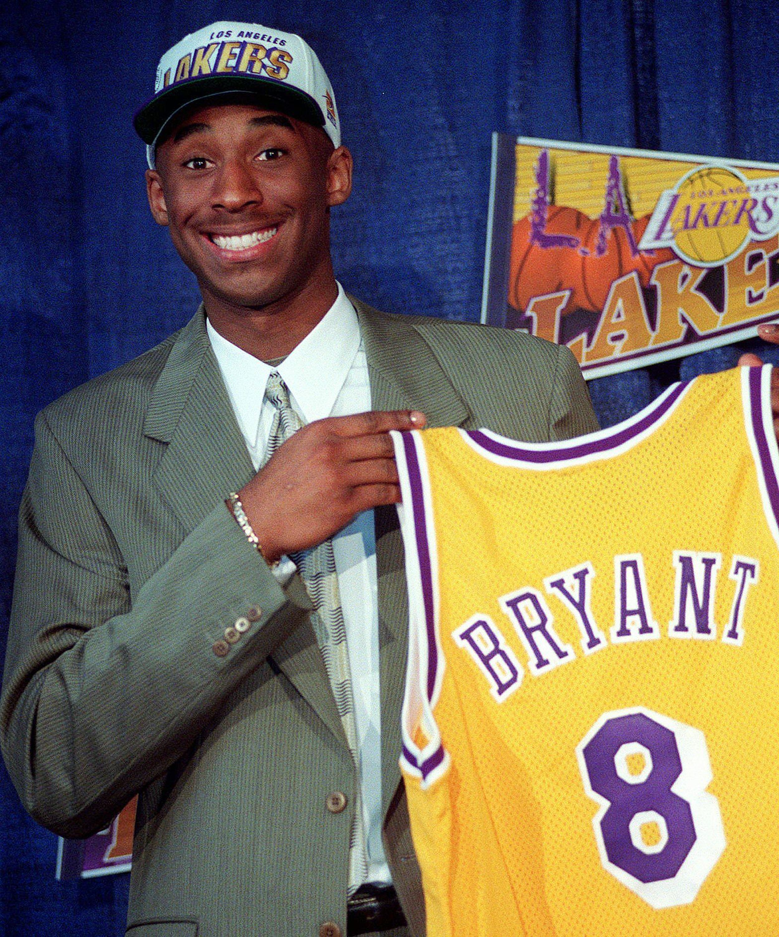 Former University of Houston baseball captain 1 of 9 on chopper with Kobe  Bryant