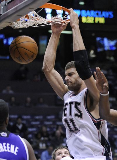 Brook Lopez scored 37 points in New Jersey’s 118-110 win over Detroit. (Associated Press)