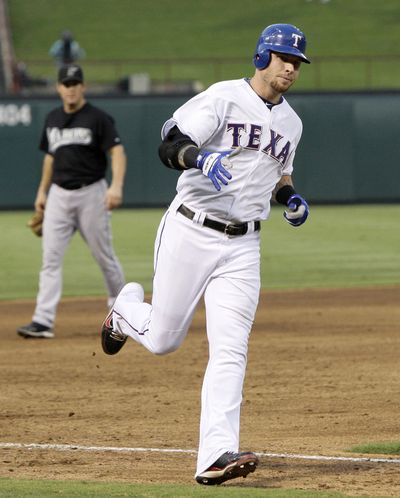 Rangers’Josh Hamilton homered twice in a 9-5 loss to the Marlins on Saturday. (Associated Press)
