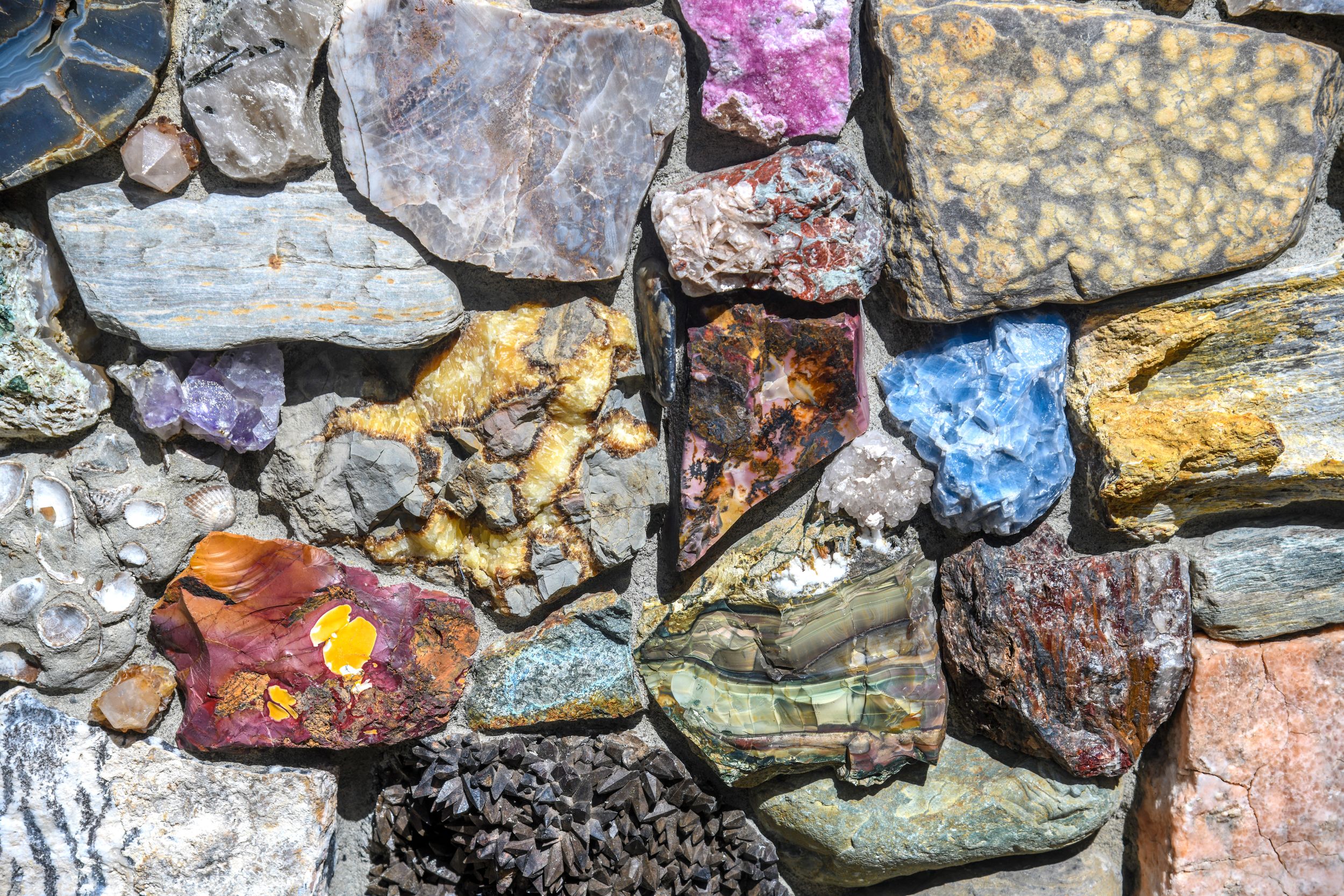 Pandemic projects: Creating wall art: Rockhounds build backyard 'sculpture'  from rock collection