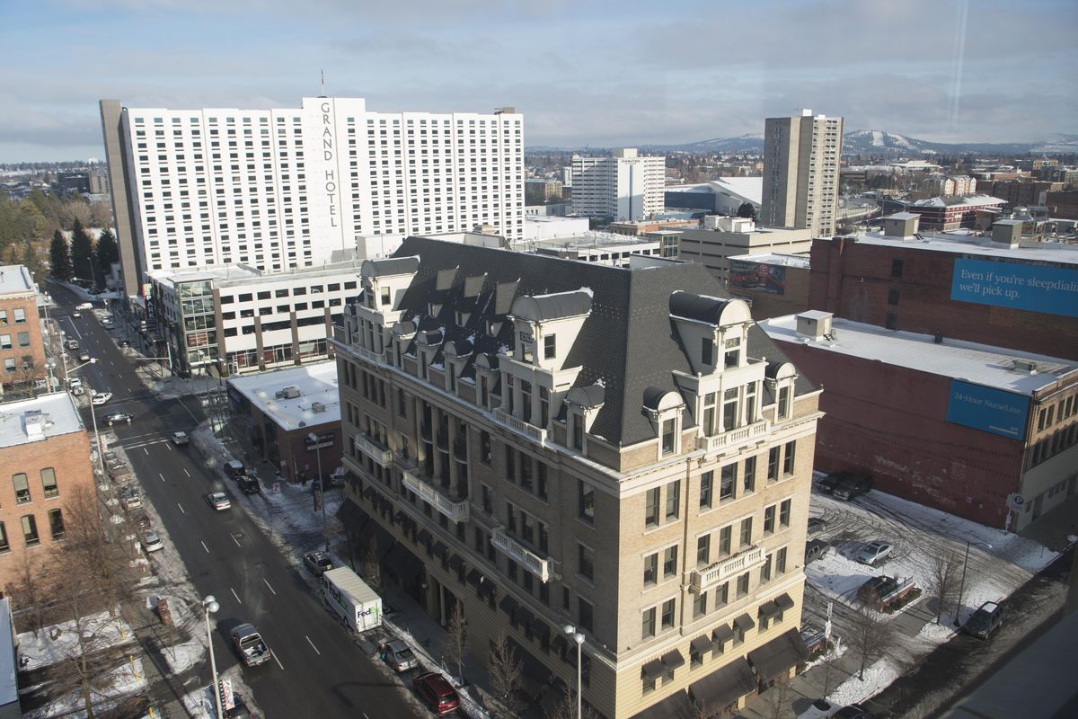 2018: The American Legion building in the foreground has housed the Spokane Club, the Chamber of Commerce, American Legion Post 9 and many other businesses and offices since it was built in 1900. The steep roof and elaborate dormers were burned off in a 1939 fire, but it was recreated by Steve and Tresa Schmautz starting in 2003. (Jesse Tinsley / The Spokesman-Review)