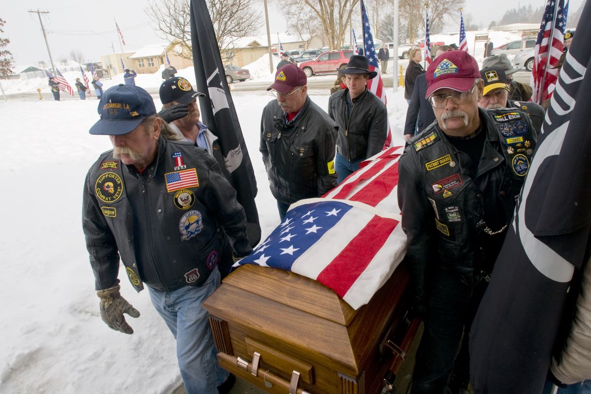 At the LDS church in Colville, Wash., Friday, Feb. 6, 2009, members of the Patriot Guard act as pallbearers for the casket of CW2 Benjamin Harris Todd who died Jan. 26, 2009 in a U.S. Army helicopter crash in Kirkuk, Iraq. COLIN MULVANY The Spokesman-Review
 (Colin Mulvany / The Spokesman-Review)