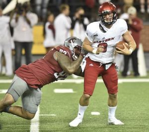 Robert Barber (92) sacks Eastern Washington quarterback Gage Gubrud (8) during both team’s 2016 season-opener. (Tyler Tjomsland/SR photo)