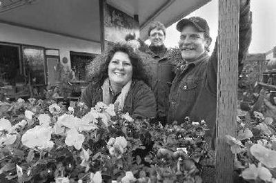 
Judy's Enchanted Garden owners Judy Ritz-Dalnes and Jeff Dalnes, and employee Jim King, center, are busy back at the shop after a slow winter season. 
 (CHRISTOPHER ANDERSON / The Spokesman-Review)
