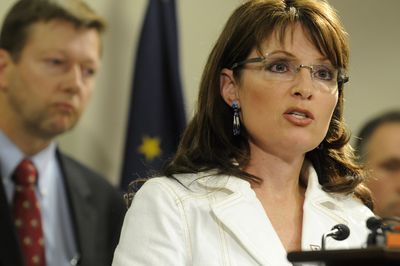 Alaska Gov. Sarah Palin and Attorney General Talis Colberg answer questions at a press conference in Anchorage on Aug. 13 about Colberg’s inquiry into issues surrounding the recent firing of Public Safety Commissioner Walt Monegan.  (Associated Press / The Spokesman-Review)