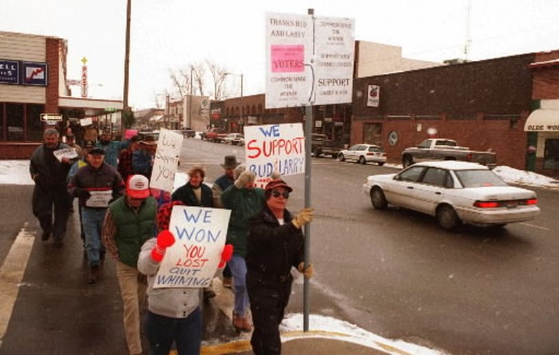 In this January 1997 SR file photo, supporters of controversial Bonner County Commissioners Bud Mueller and Larry Allen take to the streets of Sandpoint to show support. Mueller and Allen stoked controversy immediately after taking office by scrapping the county building code.