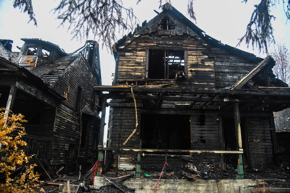 An October 2018 fire caused extensive damage to the home at 111 E. Sinto Avenue. A second home to the west also burned in the blaze. (Dan Pelle / The Spokesman-Review)