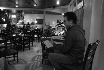 Musician  Sam Endress plays at Ambrosia Bistro to a Valentine's Day crowd.
 (J. BART RAYNIAK / The Spokesman-Review)