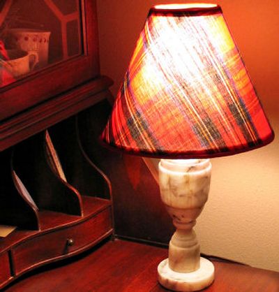 
Tartan and plaid items, like this vintage lampshade, add warmth to cold winter days.  
 (Cheryl-Anne Millsap / The Spokesman-Review)