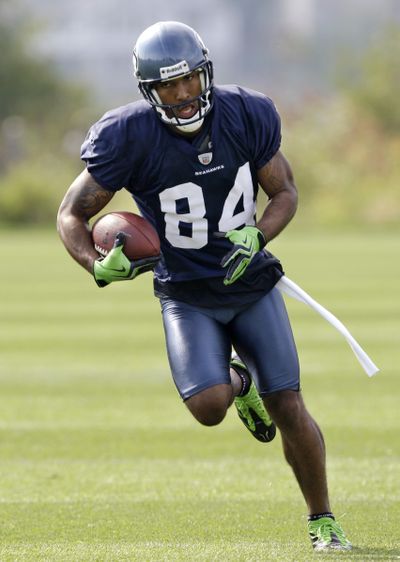 T.J. Houshmandzadeh will see his first action with Seattle tonight. (Associated Press / The Spokesman-Review)
