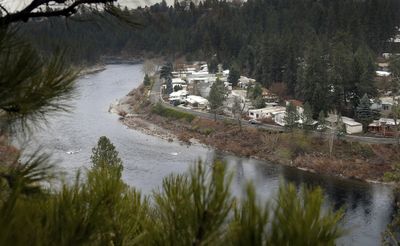 The Sans Souci Mobile Home Park sits on a bend in the Spokane River in this view looking east from Fort  George Wright Drive. Regulations barring development within 100 feet of a shoreline would prohibit this location from housing, but Sans Souci would most likely be grandfathered.  (CHRISTOPHER Anderson / The Spokesman-Review)