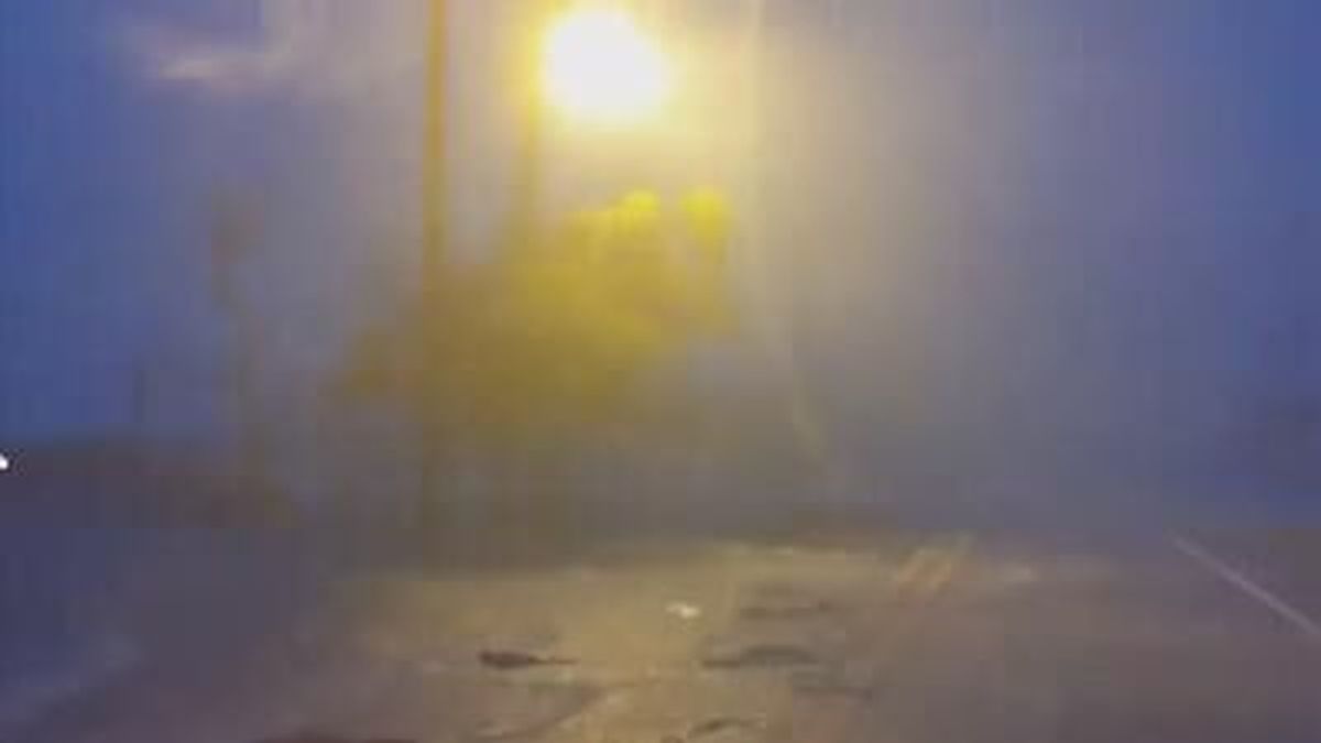 Hurricane Nicholas was quickly downgraded to a tropical storm after it hit the Texas coast and dumped more than a foot of rain.
