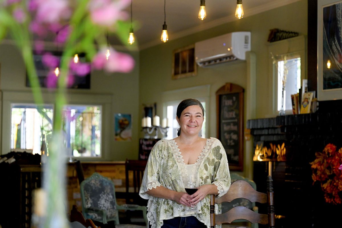 Amber Park, of Pacific to Palouse Wine Bar, is photographed on Sept. 10. She hopes the wine bar, which features family- and dog-friendly areas, will be a living room for the South Perry neighborhood.  (Kathy Plonka/The Spokesman-Review)