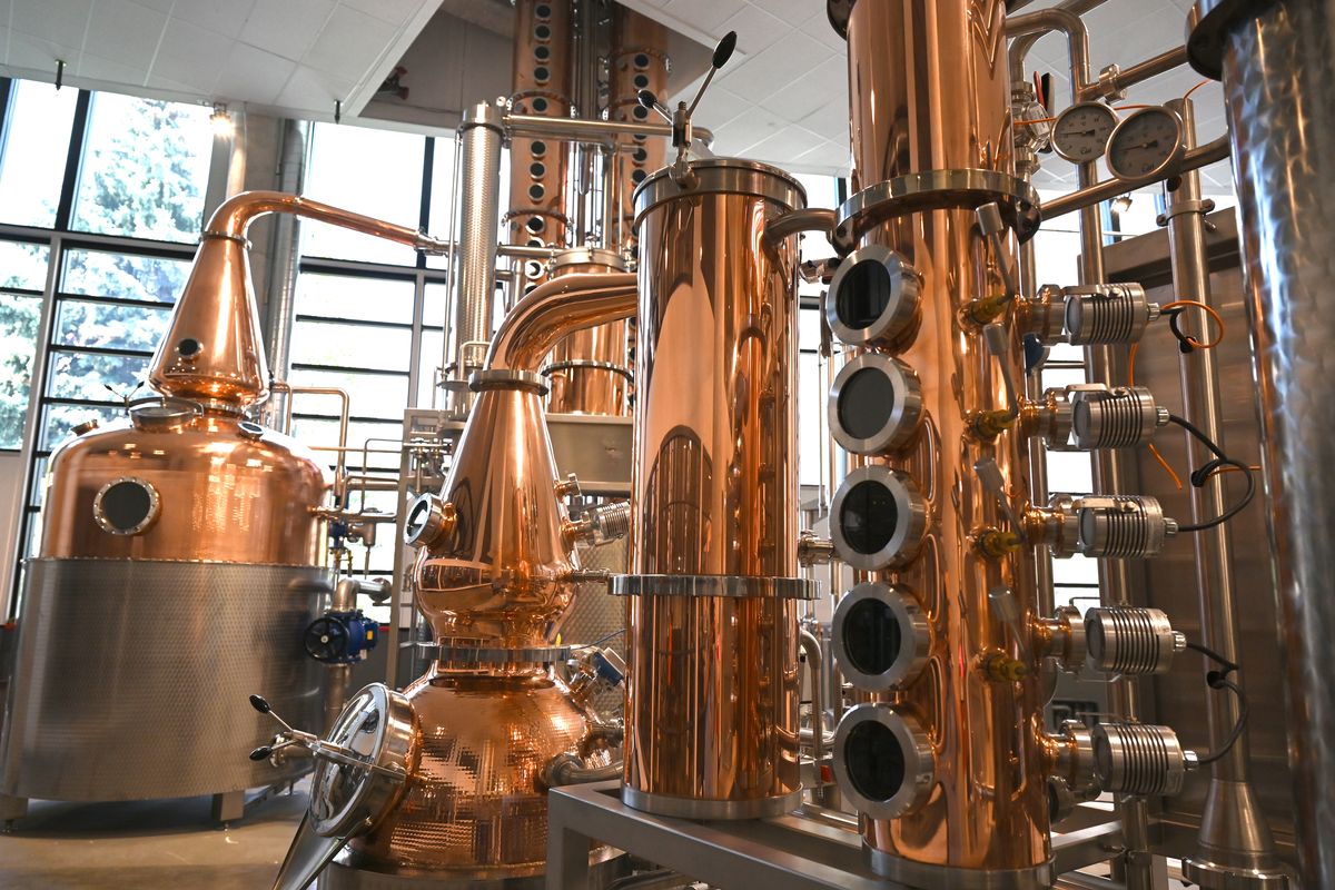 Distilling equipment is nearing complete installation at the Dry Fly Distilling tasting room, shown Wednesday, July 14, 2021 in downtown Spokane. The local distillery has built out their space in the former Spokesman-Review production facility and is moving operations from their location in East Spokane. The tasting room opens July 15.  (Jesse Tinsley/THE SPOKESMAN-REVI)