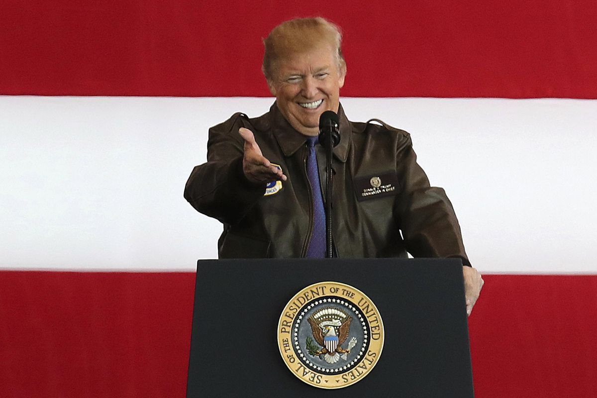 U.S. President Donald Trump delivers  a speech to  U.S. military personnel upon his arrival at the U.S. Yokota Air Base on the outskirts of Tokyo, Sunday, Nov. 5, 2017. (Eugene Hoshiko / Associated Press)