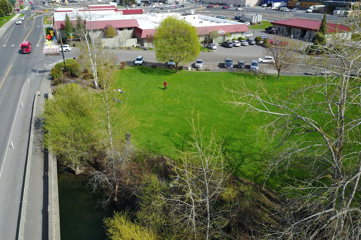 The green space across the road from Union Gospel Mission, known as Harry Altmeyer Park, is owned UGM and the city. The mission was ready to allow the city to put a stormwater swale on their portion in trade for two commercial lots on the other side of the mission building. but the Spokane City Council tabled the deal at a meeting on Monday, April 22, 2019. (Jesse Tinsley / The Spokesman-Review)