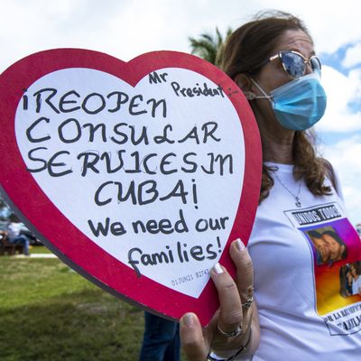 Marietta Medialdea holds a heart-shaped candy box with a message to President Joe Biden to 