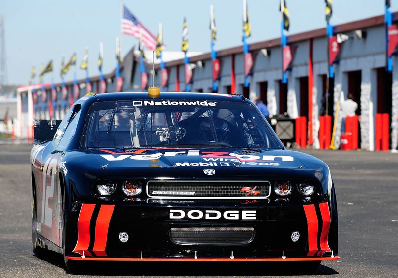 Justin Allgaier takes the No. 12 Dodge Challenger out of the Talladega Superspeedway garage and onto the track during Monday's NASCAR Nationwide Series new car test. (Photo Credit: Rusty Jarrett/Getty Images for NASCAR) (Rusty Jarrett / The Spokesman-Review)
