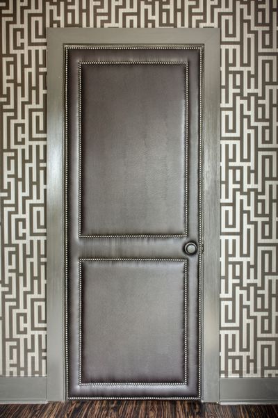 A leather door designed by Brian Patrick Flynn. Whether your style is traditional or modern, subtle or bold, improving your doors can give your rooms an easy facelift.
