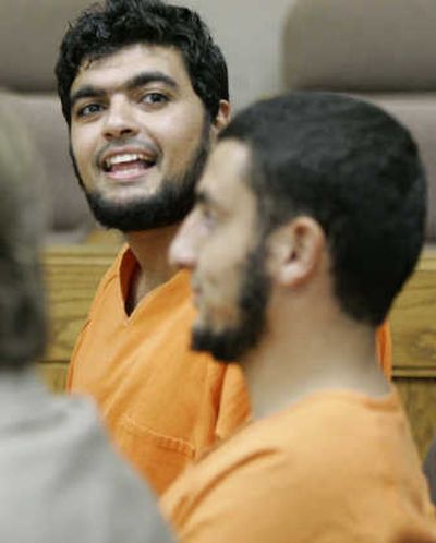
Ahmed Abda Sherf Mohamed, 24, smiles Monday during a bond hearing with co-defendant Yousef Samir Megahed.Associated Press
 (Associated Press / The Spokesman-Review)
