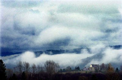 
Old Mission State Park features the oldest standing building in Idaho. The Cataldo Mission, seen in early morning fog, was built between 1843 and 1858 by two missionaries and about 300 Coeur d'Alene Indians.
 (File/ / The Spokesman-Review)