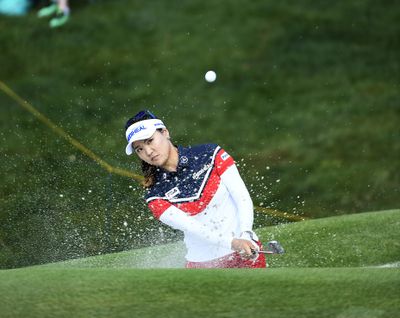 So Yeon Ryu chips out of the sand trap on the 18th hole during the LPGA Wal-Mart NW Arkansas Championship. Ryu won the tournament by two shots. (Michael Woods / Associated Press)