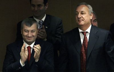 Abkhazia leader Sergei Bagapsh, right, and South Ossetian leader Eduard Kokoity applaud during the State Duma session in Moscow on Monday.  (Associated Press / The Spokesman-Review)