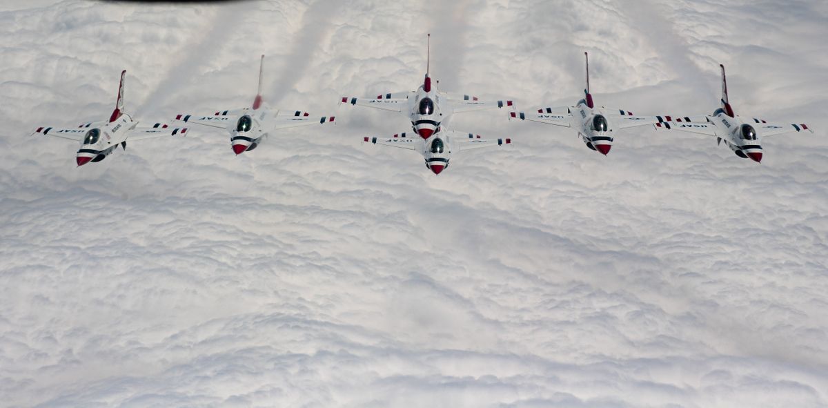 The Air Force Thunderbirds fly in a close formation after refueling from a KC-135 Stratoganker on Thursday, May 12, 2022, as the Thunderbirds make their way to Fairchild Air Force Base for Skyfest this weekend in Airway Heights, Wash.  (Tyler Tjomsland/The Spokesman-Review)