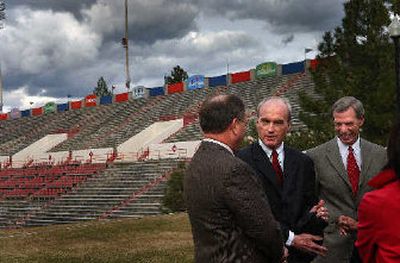 
Spokane Mayor Dennis Hession, center, jokes with Spokane Public Schools Superintendent  Brian Benzel, left, and Mead School District Superintendent Al Swanson before a press conference Thursday at Joe Albi Stadium. 
 (Brian Plonka / The Spokesman-Review)