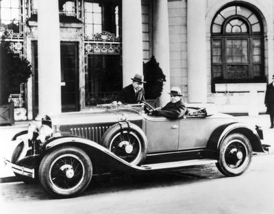 Stylist Harley Earl sits at the wheel of a 1927 LaSalle, with  Cadillac Chief Larry Fisher at left. Earl, universally considered the father of automotive design, made the LaSalle the first production car designed from the ground up by a professional designer.  (File Associated Press / The Spokesman-Review)