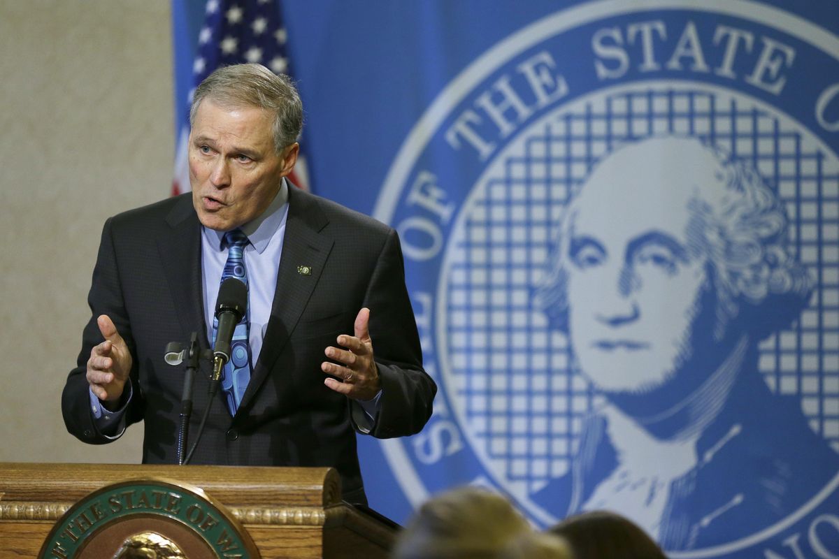 Washington Gov. Jay Inslee talks to reporters Monday, March 6, 2017, at the Capitol in Olympia, Wash. (Ted S. Warren / Associated Press)