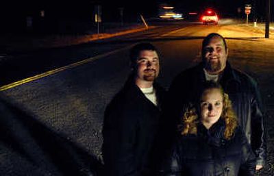 
Huetter mayor-elect Brad Keene, left, and Huetter City Council members Luke Gibler and Jeni Brown stand at the intersection of Seely and Seltice Road near Huetter. 
 (Kathy Plonka / The Spokesman-Review)