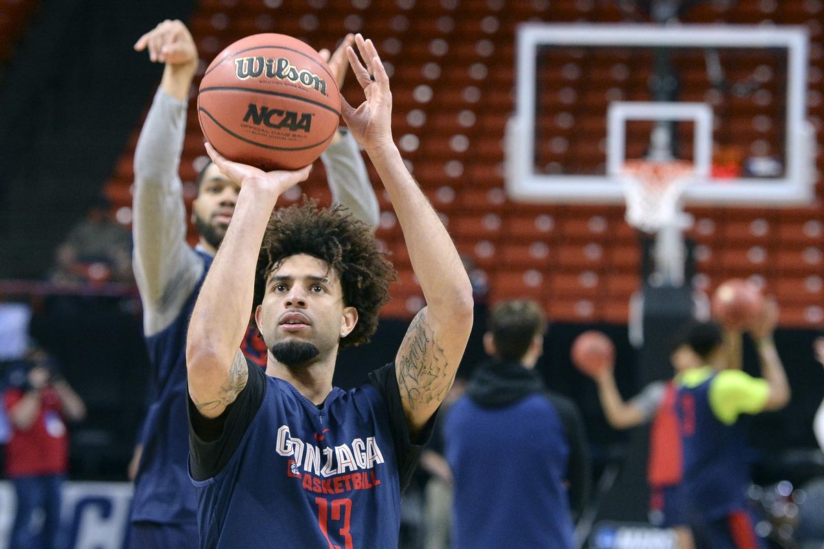 Gonzaga guards Josh Perkins, front, and Silas Melson launch shots during practice at Taco Bell Arena in Boise. (Dan Pelle / The Spokesman-Review)