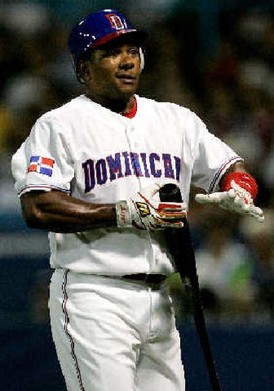 
Miguel Tejada reacts after Puerto Rico starter Javier Vazquez strikes him out.  
 (Associated Press / The Spokesman-Review)
