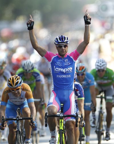Alessandro Petacchi of Italy celebrates after winning fourth stage. (Associated Press)