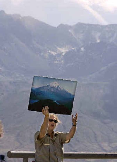 
With the crater behind her, the USFS's Anna White displays a 