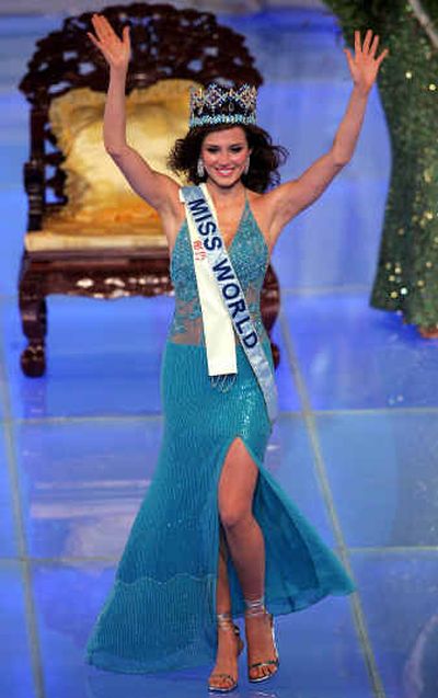 
Miss Peru Maria Julia Mantilla Garcia celebrates after being crowned as Miss World 2004 Saturday in Sanya on south China's Hainan Island.
 (Associated Press / The Spokesman-Review)