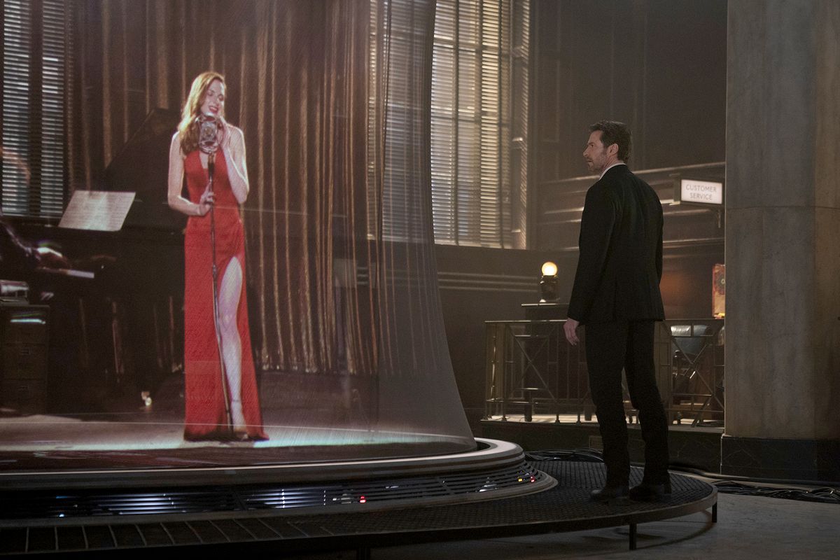 Rebecca Ferguson and Hugh Jackman in “Reminiscence."   (Ben Rothstein/Warner Bros. Pictures)