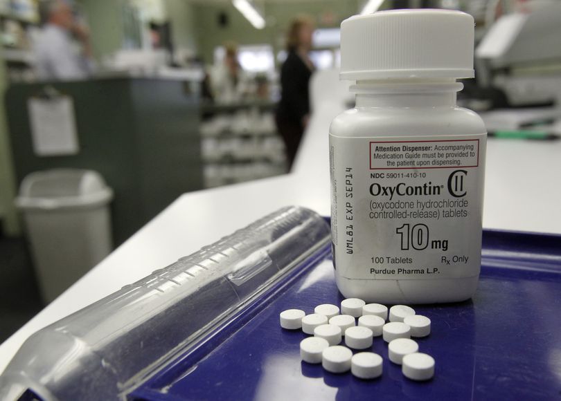 OxyContin pills are arranged for a photo at a pharmacy in Montpelier, Vt. on Tuesday, Feb. 19, 2013. Drug overdose deaths rose for the 11th straight year, federal data show, and most of them were accidents involving addictive painkillers despite growing attention to risks from these medicines. As in previous recent years, opioid drugs � which include OxyContin and Vicodin � were the biggest problem, contributing to 3 out of 4 medication overdose deaths. (Toby Talbot / Associated Press)