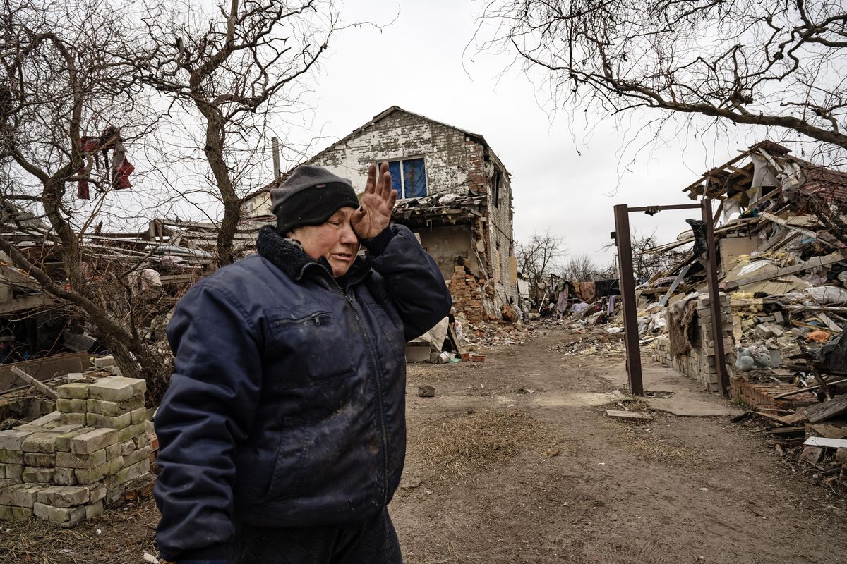 Nina Yevlakhova, 63, outside the remains of her home in Ruski Tyshky, near Kharkiv, Ukraine, on Sunday, Jan. 22, 2023. (Lynsey Addario/The New York Times) -- NO SALES. --  (LYNSEY ADDARIO)