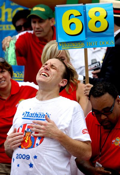 Joey Chestnut defeated former champion Takeru Kobayashi at Coney Island’s annual contest.  (Associated Press / The Spokesman-Review)