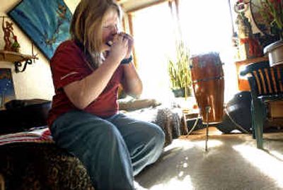
Forest Greenwood-Govedare, 12, passionately plays the blues on his harmonica at home near Chewelah on Wednesday morning. 
 (Holly Pickett / The Spokesman-Review)