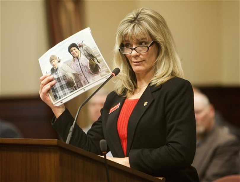 Joan Hurlock, the second woman to serve on Idaho’s Fish & Game Commission, speaks before the Senate Resources and Environment Committee on Monday, Feb. 4, 2013. Hurlock, who showed pictures of her outdoor activities, was appointed by the governor in June, needs to be confirmed by the committee for a term that would commence July 1, 2012 and expire June 30, 2016.  (AP/Idaho Statesman / Katherine Jones)