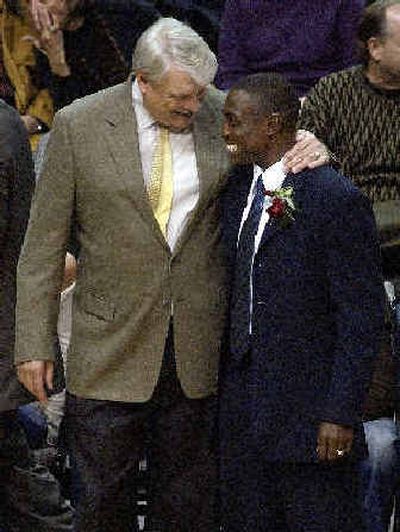 
Don Nelson, left, gave then-assistant coach Avery Johnson, a smile and a hug during a November game.
 (Associated Press / The Spokesman-Review)